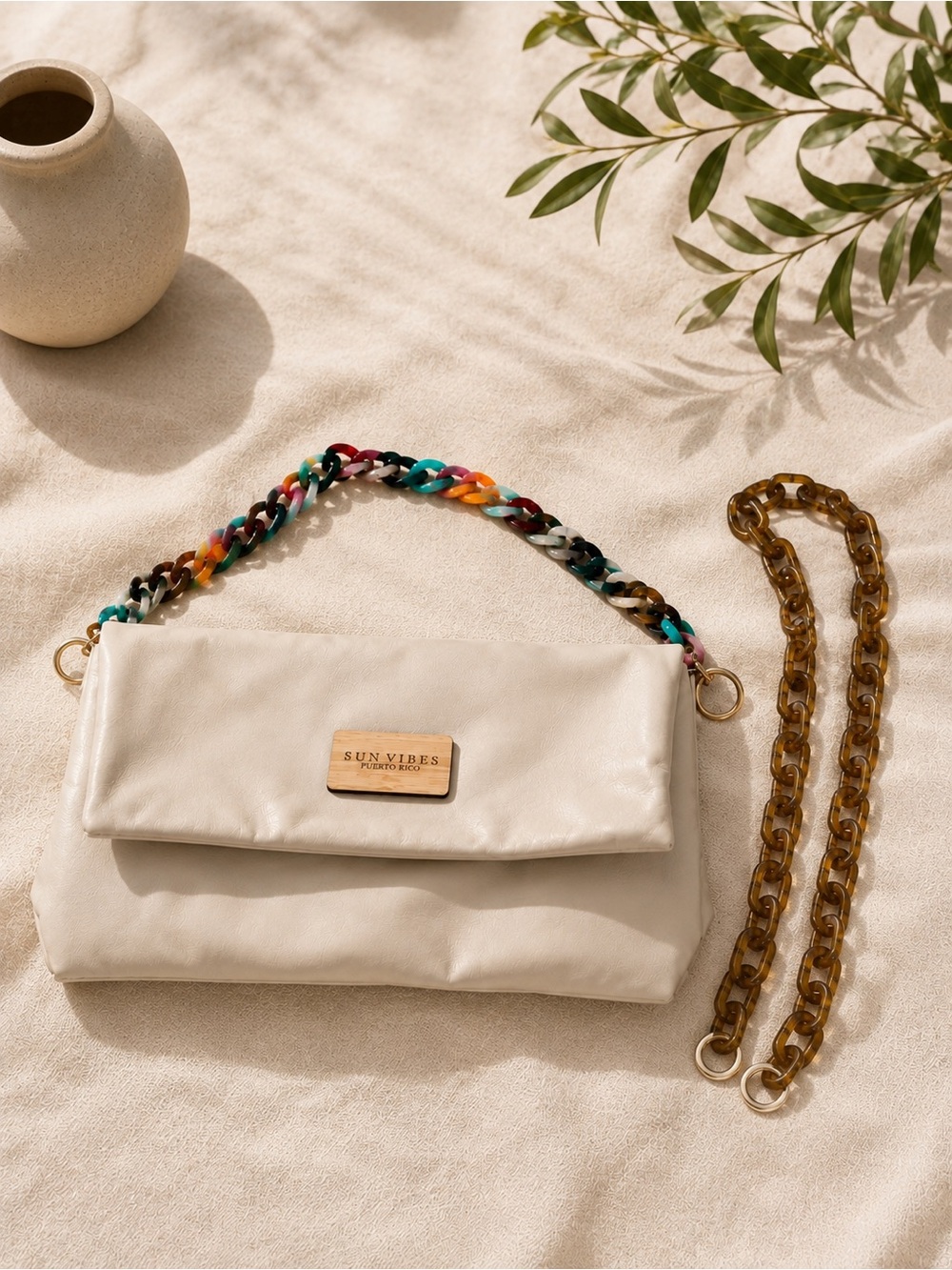 Cream Fold-Over Shoulder Bag with Multicolor Chain Accent and brown chain